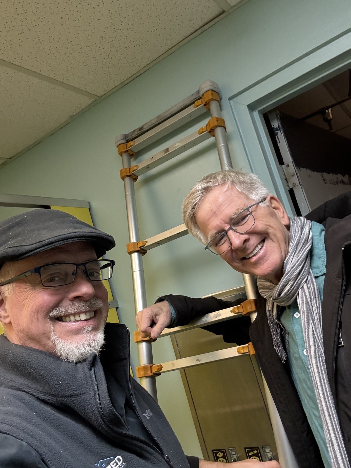 Bryan D. Mize on site at the Lynnwood Hygiene Center with Rick Steves, December 2025