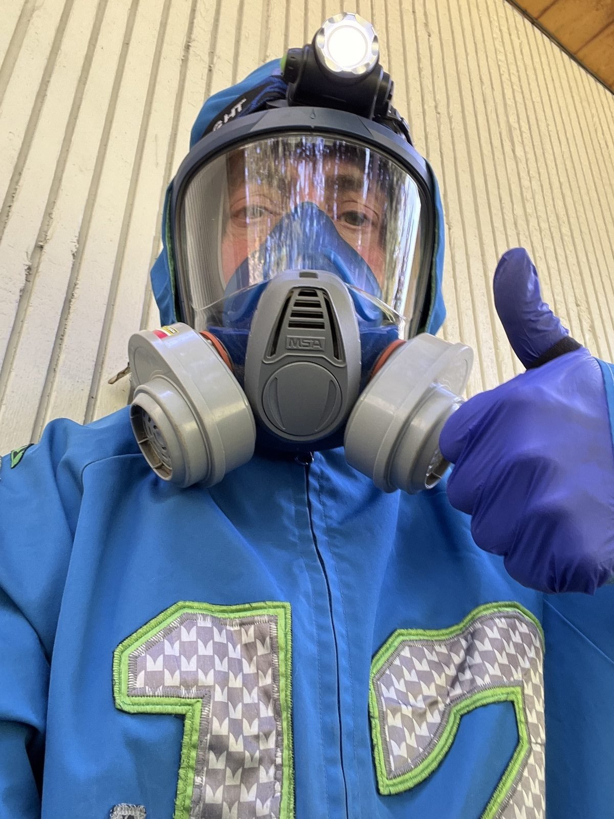 Bryan Mize suited up for crawlspace inspection