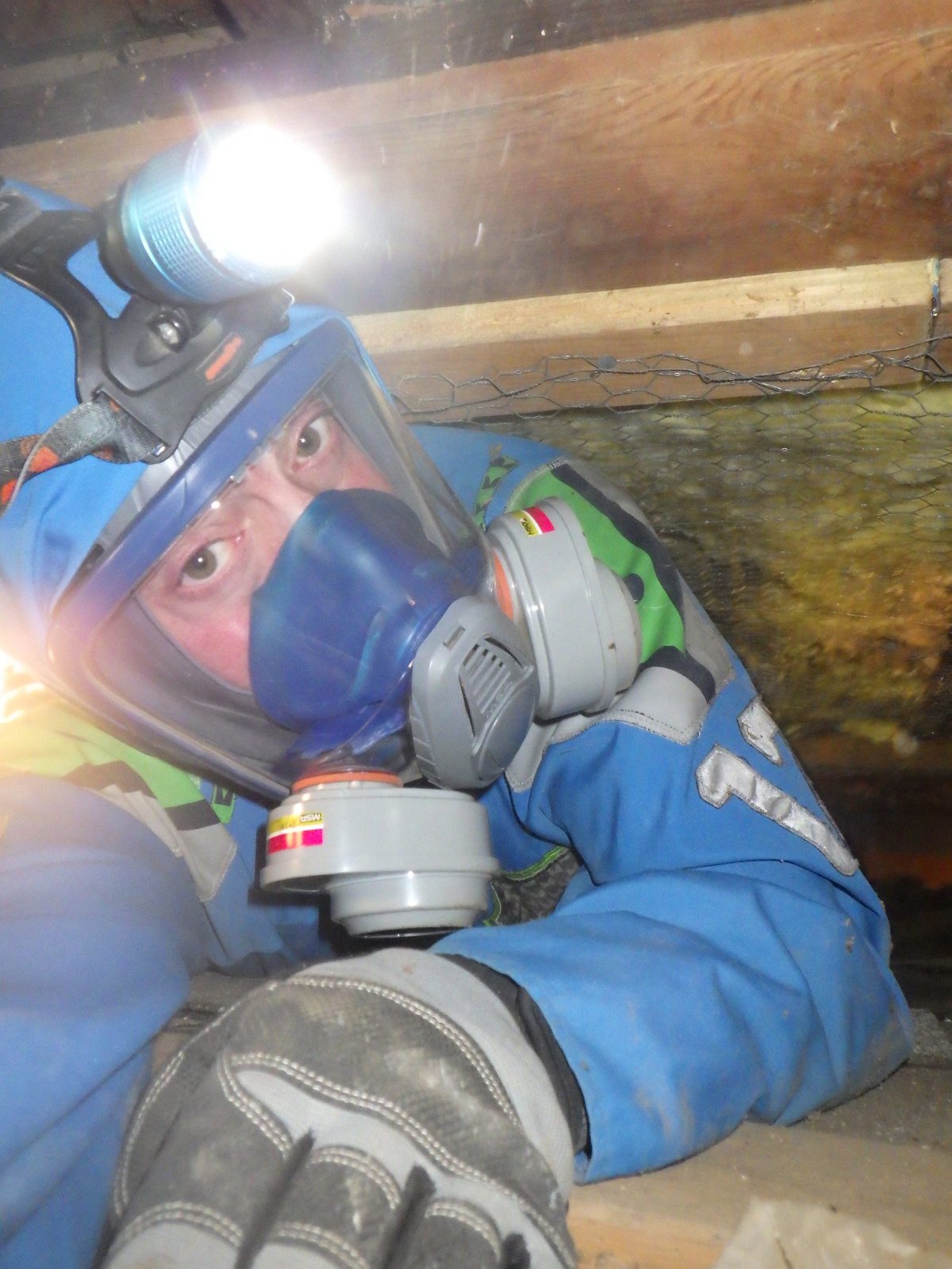 Bryan Mize in extremely tight crawlspace